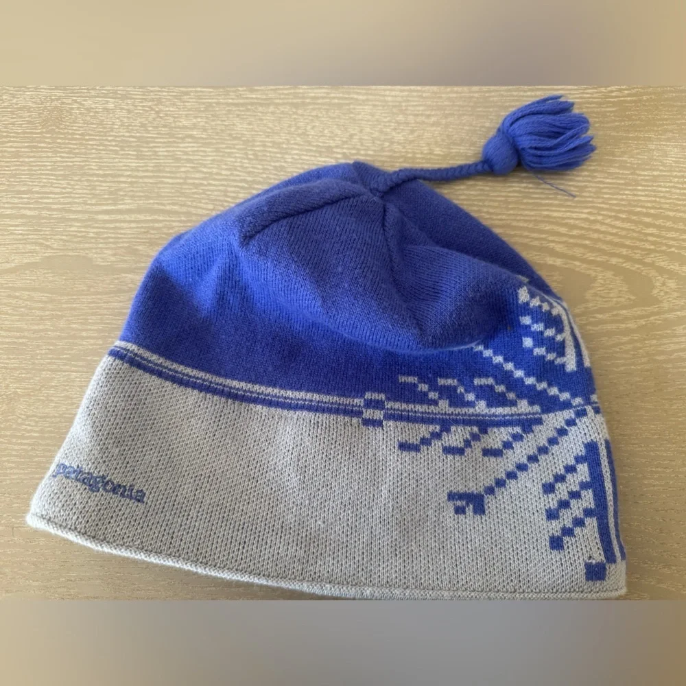 Patagonia Beanie Hat, snowflake design with small tassel top.